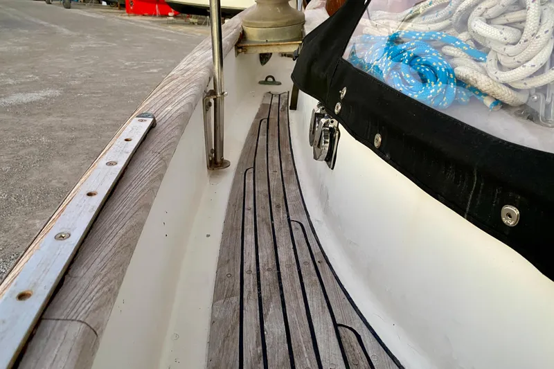 Slide: The Image of Deck view of 1991 Hans Christian 41 T Molakai sailboat with ropes and wooden trim. - 77