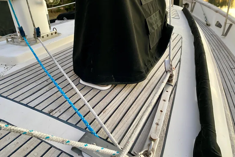 Slide: The Image of Deck of 1991 Hans Christian 41 T Molakai sailboat with ropes and fittings. - 82