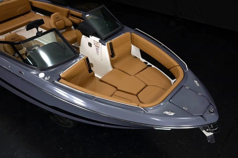 Slide: The Image of Manufacturer Provided Image: 2026 Chaparral GTS 6 boat with luxurious tan seating and sleek design. - 4