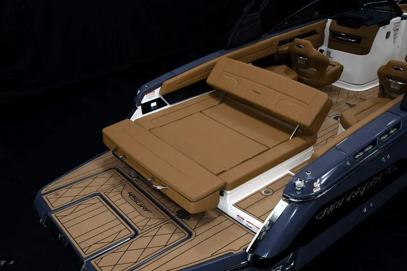 Slide: The Image of Manufacturer Provided Image: 2026 Chaparral GTS 6 boat interior with luxurious tan seating and sleek design. - 8