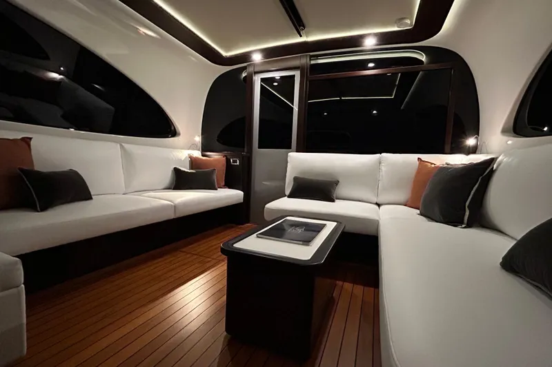Slide: The Image of Luxurious interior of 2021 Palm Beach Motor Yachts GT60 with elegant seating and modern design. - 13