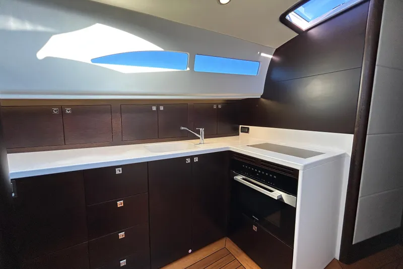 Slide: The Image of Luxurious kitchen interior of 2021 Palm Beach Motor Yachts GT60 with modern appliances. - 16