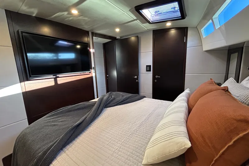 Slide: The Image of Luxurious bedroom interior of 2021 Palm Beach Motor Yachts GT60 with modern design and amenities. - 21