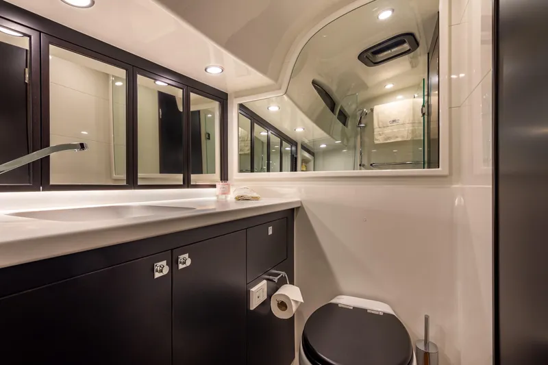 Slide: The Image of Luxurious bathroom interior of 2021 Palm Beach Motor Yachts GT60, featuring modern fixtures and elegant design. - 24