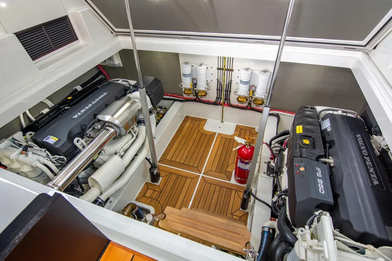 Slide: The Image of Engine room of 2021 Palm Beach Motor Yachts GT60 with Volvo Penta engines. - 26
