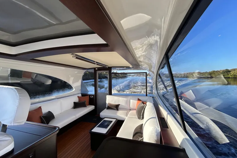 Slide: The Image of Luxurious interior of 2021 Palm Beach Motor Yachts GT60 with scenic water view. - 10
