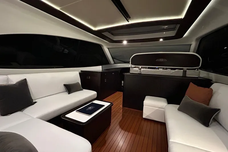 Slide: The Image of Luxurious interior of 2021 Palm Beach Motor Yachts GT60 with elegant seating and wood flooring. - 14