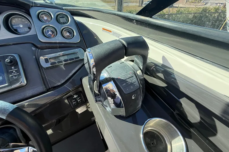 Slide: The Image of Dashboard of 2014 Monterey 328SS Super Sport boat with controls and gauges. - 30