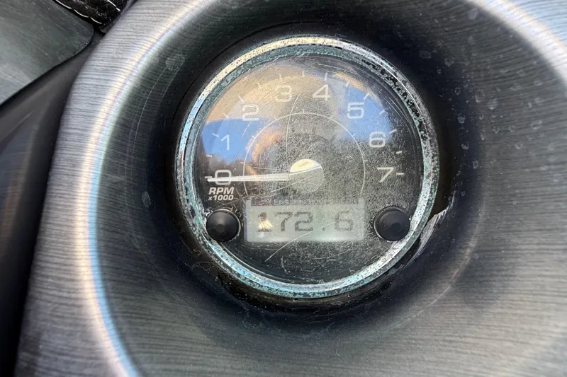 Slide: The Image of Close-up of a 2014 Monterey 328SS Super Sport tachometer displaying RPM. - 35