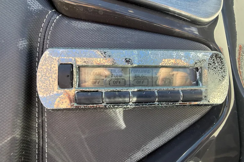 Slide: The Image of Control panel of a 2014 Monterey 328SS Super Sport boat with visible wear. - 39