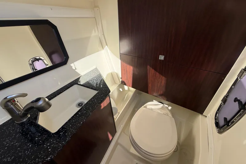 Slide: The Image of Luxurious bathroom in 2014 Monterey 328SS Super Sport boat with modern fixtures. - 52