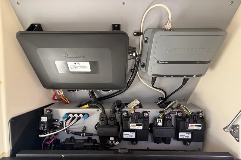 Slide: The Image of Electrical panel of a 2014 Monterey 328SS Super Sport boat with Medallion and Raymarine components. - 55