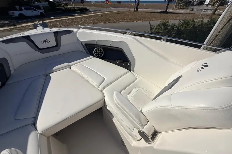 Slide: The Image of Luxurious interior of a 2014 Monterey 328SS Super Sport boat with white seating. - 59