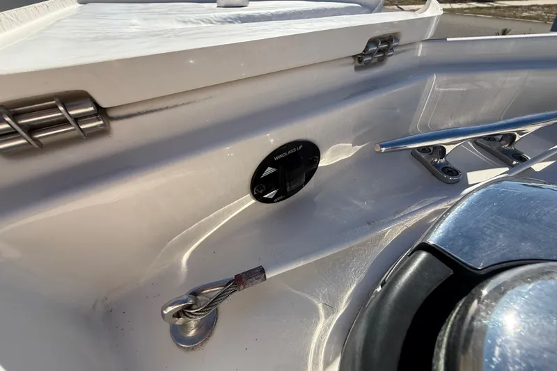 Slide: The Image of 2014 Monterey 328SS Super Sport boat deck details with cleat and winch. - 64