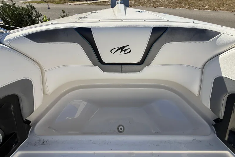 Slide: The Image of 2014 Monterey 328SS Super Sport boat interior with white and gray seating. - 72