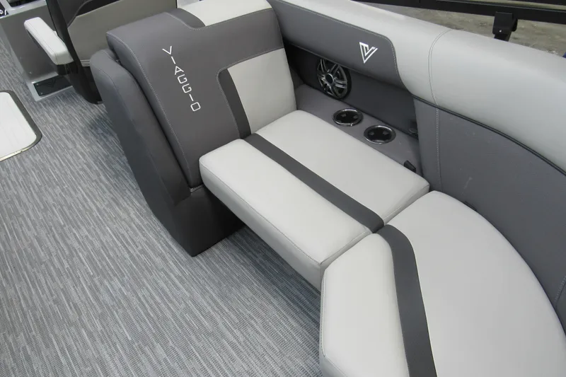 Slide: The Image of 2026 Viaggio Lago X22U boat interior with gray seating and cup holders. - 10