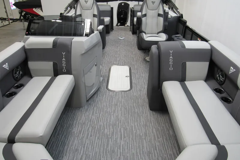 Slide: The Image of 2026 Viaggio Lago X22U boat interior with gray seating and modern design. - 3