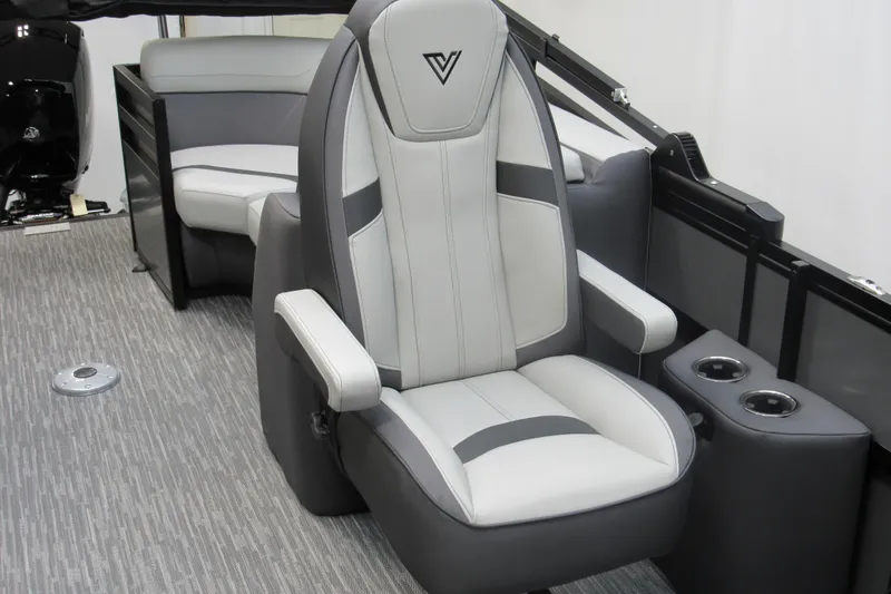 Slide: The Image of Luxurious interior of 2026 Viaggio Lago X22U boat with plush seating and cup holders. - 8