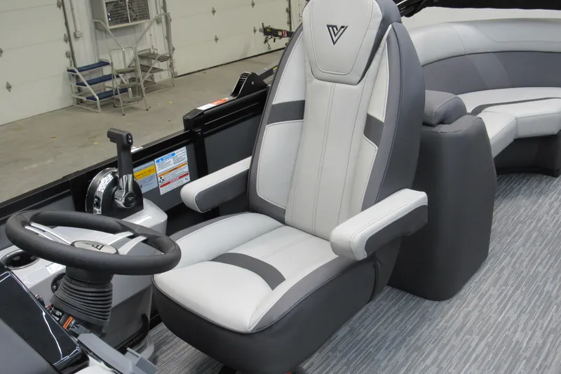 Slide: The Image of Captain's chair in 2026 Viaggio Lago X22U boat, featuring sleek design and modern controls. - 9