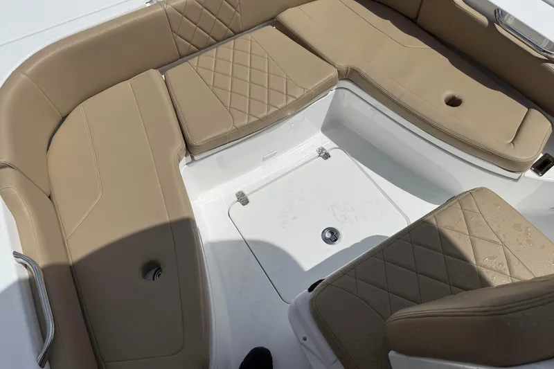 Slide: The Image of Luxurious seating area on 2026 Blazer Bay 2440 boat with tan upholstery. - 18