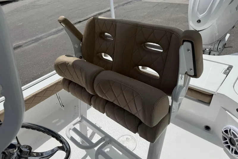 Slide: The Image of Luxurious seating on 2026 Blazer Bay 2440 boat, featuring quilted brown upholstery. - 24