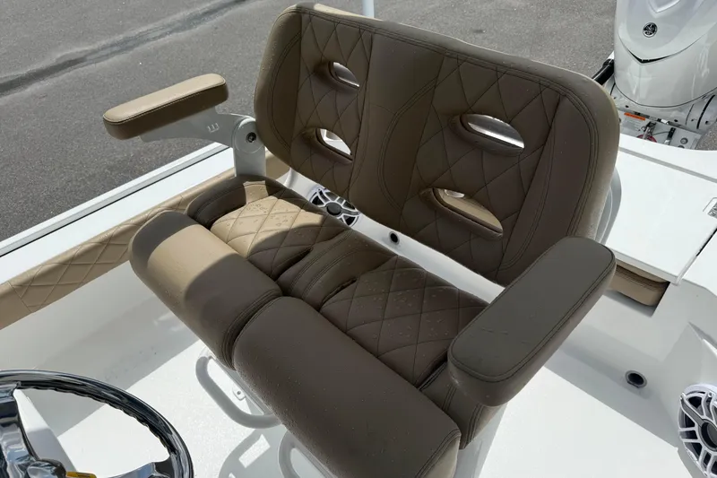 Slide: The Image of Luxurious seating on 2026 Blazer Bay 2440 boat, featuring quilted upholstery and armrests. - 25