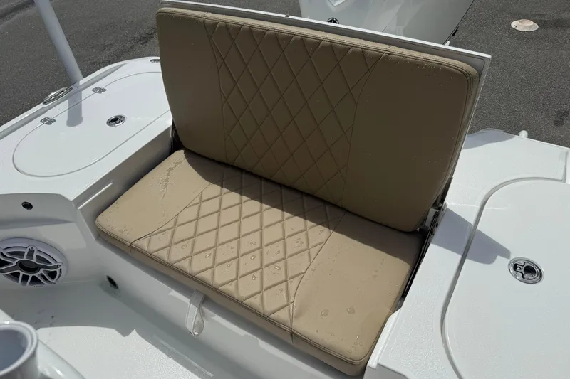 Slide: The Image of Beige cushioned seat on 2026 Blazer Bay 2440 boat, featuring diamond stitching. - 34