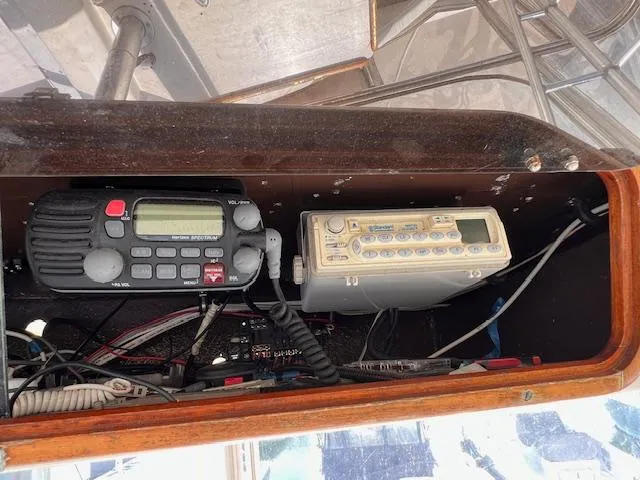 Slide: The Image of 1985 Post 43 Convertible boat radio equipment in wooden compartment. - 14