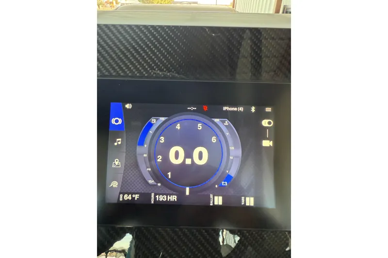 Slide: The Image of Dashboard display of a 2020 Montara Surf Boss boat, showing speed and connectivity options. - 10