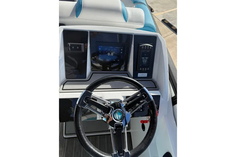 Slide: The Image of 2020 Montara Surf Boss dashboard with steering wheel and digital display. - 9