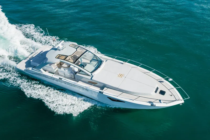 Slide: The Image of Luxurious 2017 Custom 60 yacht cruising on clear blue ocean waters. - 10