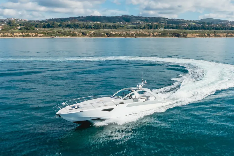 Slide: The Image of Luxurious 2017 Custom 60 yacht cruising on serene blue waters. - 11