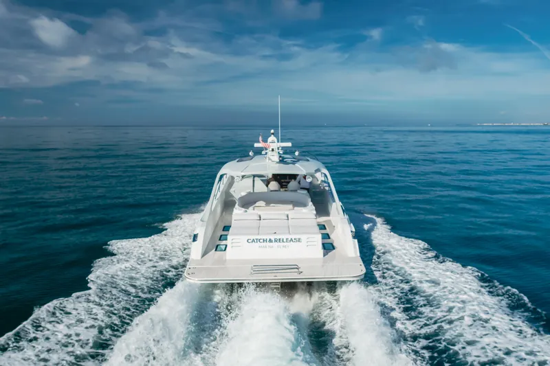 Slide: The Image of Custom 60 yacht cruising on open sea, 2017 model, with clear blue skies. - 12