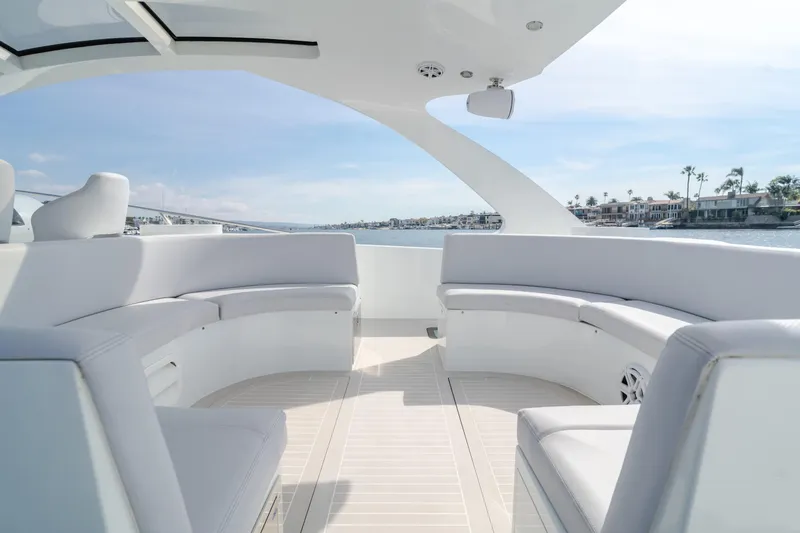 Slide: The Image of Luxurious 2017 Custom 60 yacht interior with sleek white seating and panoramic water views. - 15