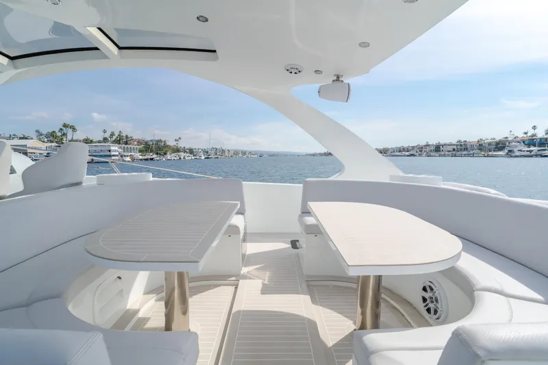 Slide: The Image of Luxurious 2017 Custom 60 yacht interior with elegant seating and ocean view. - 17