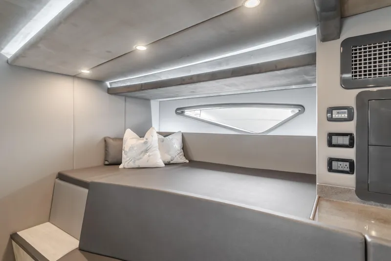 Slide: The Image of Modern interior of a 2017 Custom 60 yacht with sleek design and ambient lighting. - 41