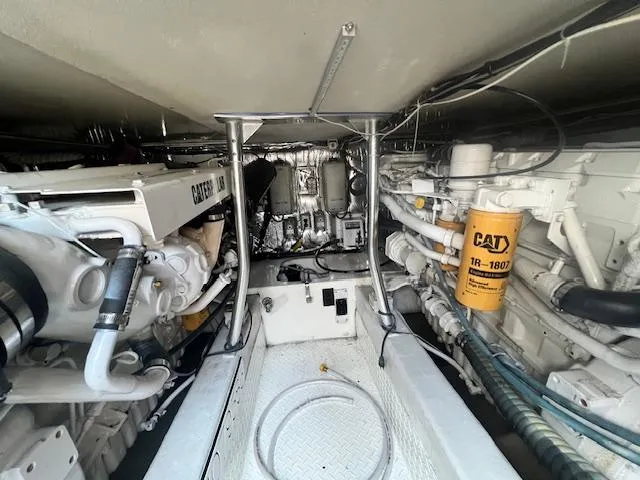 Slide: The Image of Engine room of 1998 Ocean Yachts 40 Super Sport with Caterpillar engines and CAT filter. - 28