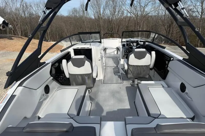 Slide: The Image of 2026 Yamaha Boats AR250 interior with modern seating and sleek design. - 6
