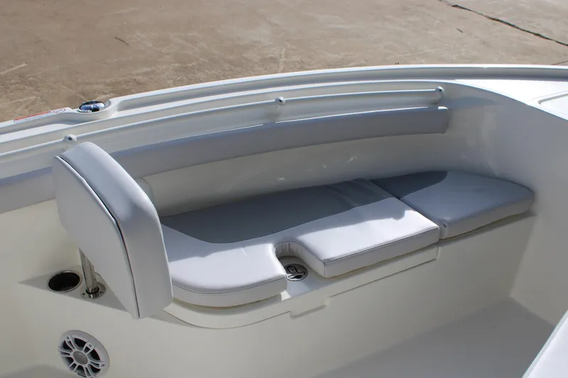Slide: The Image of 2025 Mako 214 Center Console boat with cushioned seating and sleek design. - 8
