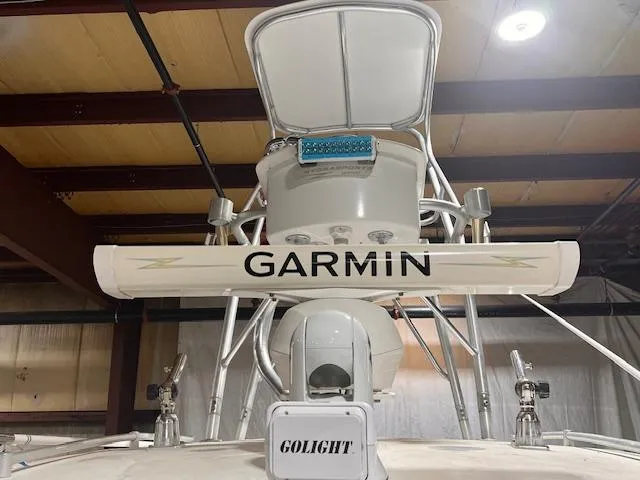 Slide: The Image of 2005 Hydra-Sports Vector 3300 CC with Garmin and Golight equipment in a storage facility. - 20