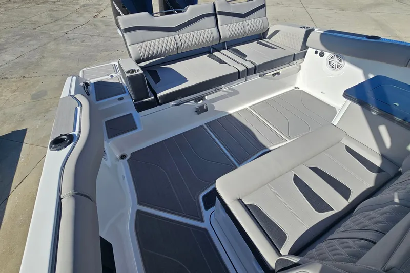 Slide: The Image of 2026 Monterey Elite 30 OB boat interior with luxurious seating and modern design. - 12