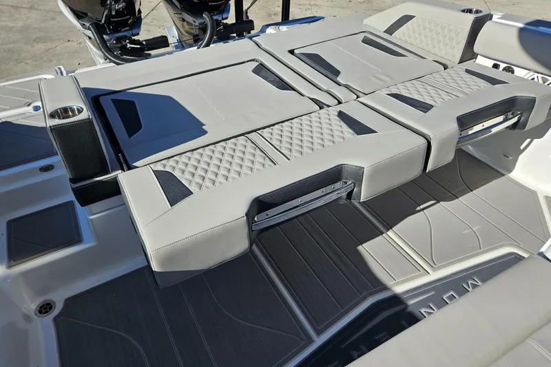 Slide: The Image of 2026 Monterey Elite 30 OB boat interior with luxurious seating and modern design. - 13