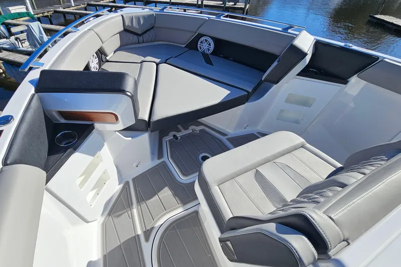 Slide: The Image of 2026 Monterey Elite 30 OB boat interior with luxurious seating and modern design. - 22
