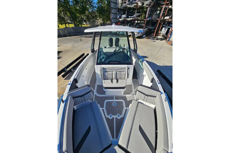 Slide: The Image of 2026 Monterey Elite 30 OB boat with sleek seating and modern design. - 25