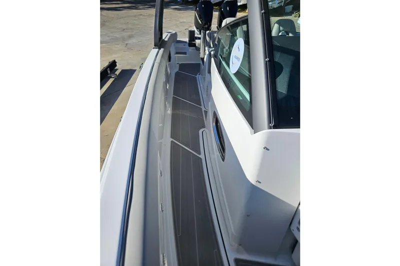 Slide: The Image of 2026 Monterey Elite 30 OB boat deck, showcasing sleek design and modern features. - 28