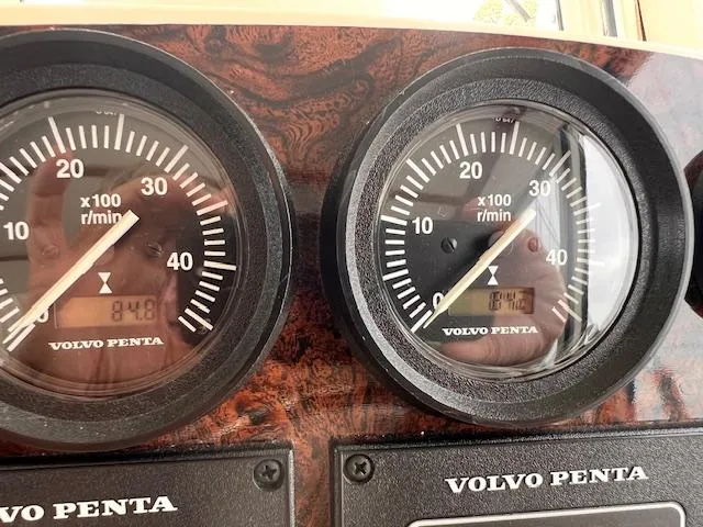 Slide: The Image of Close-up of Volvo Penta gauges on 2004 Sea Sport Voyager 3000 boat dashboard. - 23