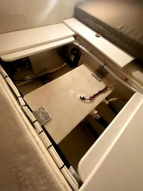 Slide: The Image of Interior view of 2004 Sea Sport Voyager 3000 boat storage compartment. - 24