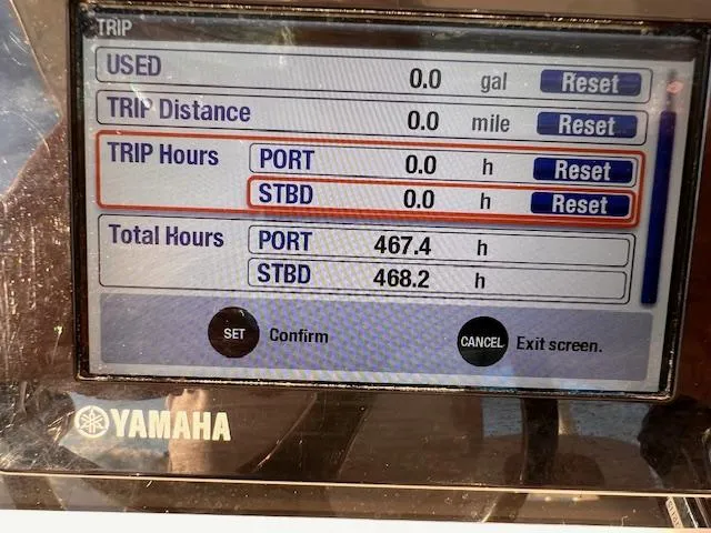 Slide: The Image of Yamaha boat display showing trip and total hours for Edgewater 280CC, 2015 model. - 12