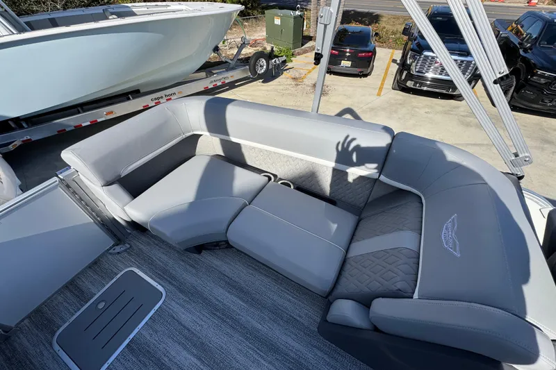 Slide: The Image of 2026 Bennington 24 MFB boat interior with gray seating and modern design. - 34
