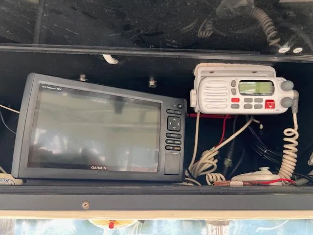 Slide: The Image of Garmin GPS and radio equipment on a 2001 Carolina Classic 28 boat. - 5
